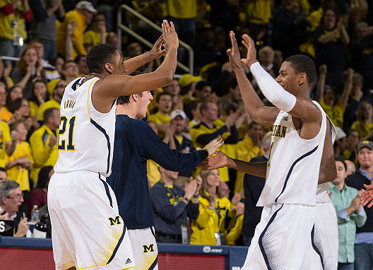 Zak Irvin (21) and Glenn Robinson III (1)