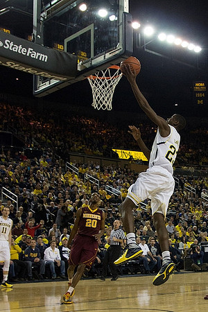 Nik Stauskas (11) and Caris LeVert (23)