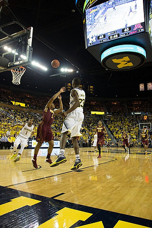 Glenn Robinson III (1) and Caris LeVert (23)
