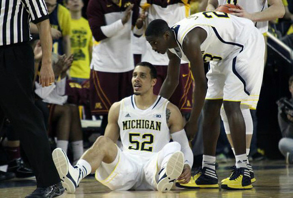 Jordan Morgan (52) and Caris LeVert (23)