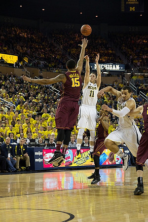 Nik Stauskas (11) and Jordan Morgan (52)