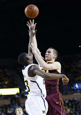 Spike Albrecht (2) and Caris LeVert (23)
