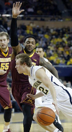 Spike Albrecht (2) and Jordan Morgan (52)