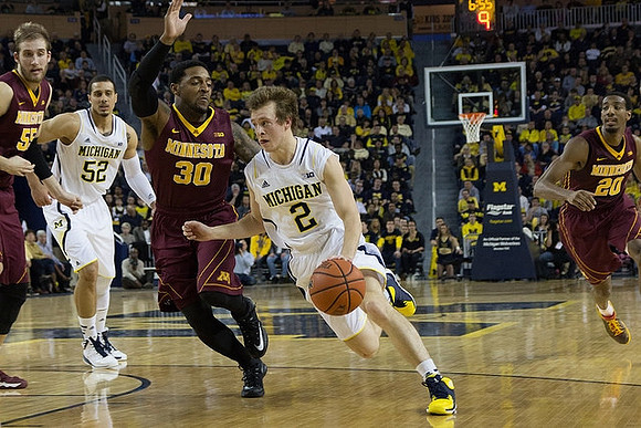 Jordan Morgan (52) and Spike Albrecht (2)