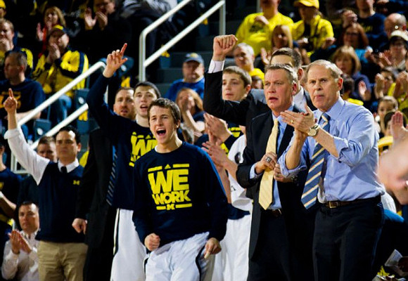 Sean Lonergan (20), Andrew Dakich (5), Mark Donnal (34), Jeff Meyer, and John Beilein