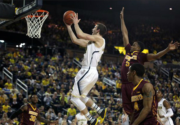 Nik Stauskas (11) and Glenn Robinson III (1)