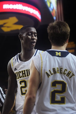 Caris LeVert (23) and Spike Albrecht (2)