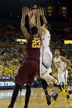 Nik Stauskas (11) and Jon Horford (15)