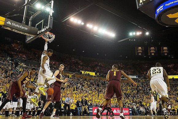 Glenn Robinson III (1) and Caris LeVert (23)