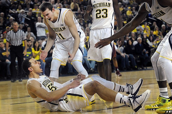 Jordan Morgan (52), Nik Stauskas (11), Caris LeVert (23), and Glenn Robinson III (1)