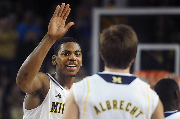 Glenn Robinson III (1) and Spike Albrecht (2)