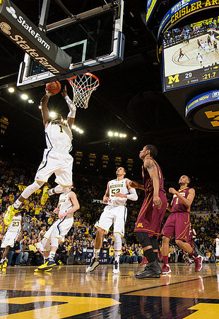 Glenn Robinson III (1), Caris LeVert (23), Nik Stauskas (11), and Jordan Morgan (52)