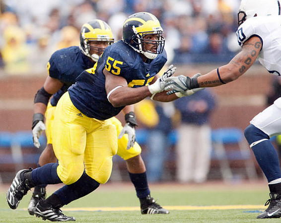 Brandon Graham (55) and Jonas Mouton (8)