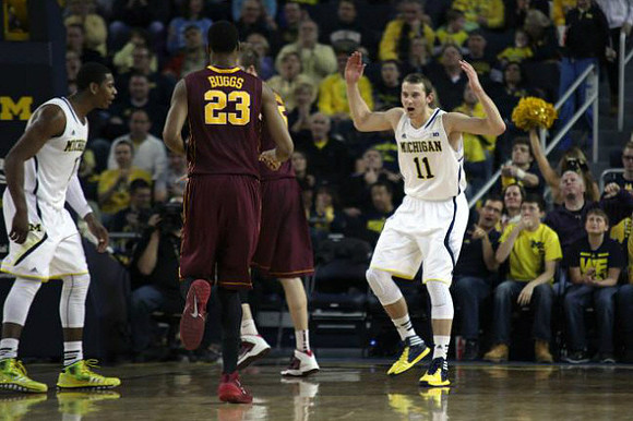 Glenn Robinson III (1) and Nik Stauskas (11)