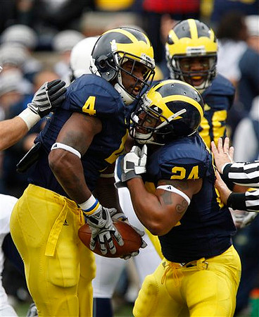 Brandon Minor (4) and Kevin Grady (24)
