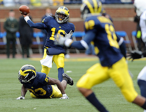 Carlos Brown (23), Denard Robinson (16), and Roy Roundtree (12)
