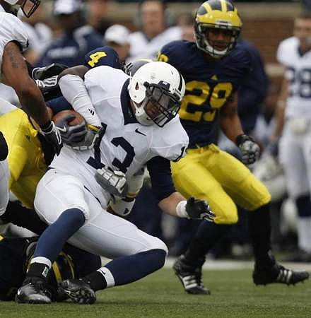 Brandon Smith (4) and Troy Woolfolk (29)