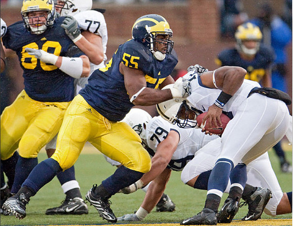 Craig Roh (88) and Brandon Graham (55)
