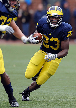 Mark Huyge (72) and Carlos Brown (23)