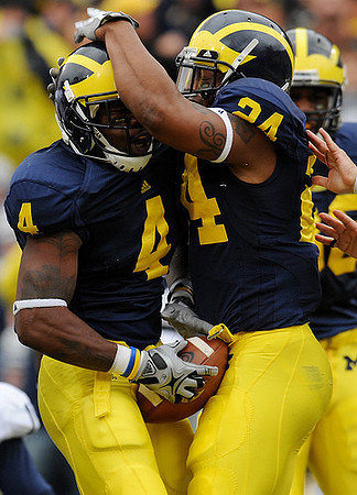 Brandon Minor (4) and Kevin Grady (24)