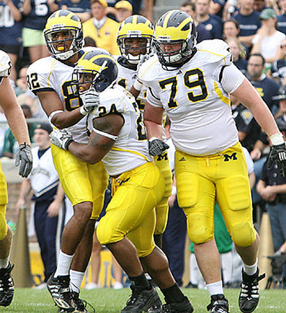 LaTerryal Savoy (82), Kevin Grady (24), and Perry Dorrestein (79)