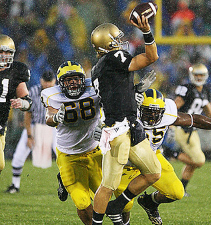 Mike Martin (68) and Brandon Graham (55)