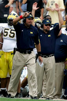 Rich Rodriguez and Brandon Graham (55)