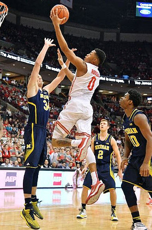 Mark Donnal (34), Spike Albrecht (2), and Derrick Walton Jr. (10)