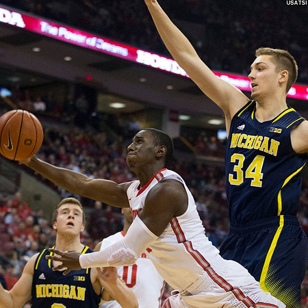 Spike Albrecht (2) and Mark Donnal (34)