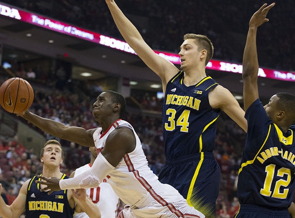 Spike Albrecht (2), Mark Donnal (34), and Muhammad-Ali Abdur-Rahkman (12)