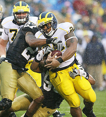 Kevin Grady (24) and Perry Dorrestein (79)