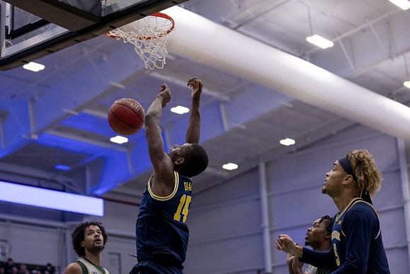 Moussa Diabate (14) and Terrance Williams II (5)