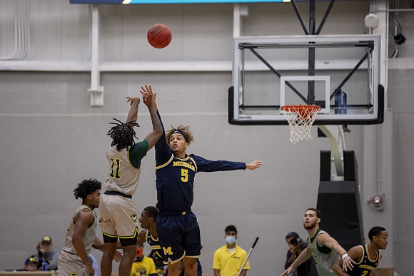 Terrance Williams II (5), Moussa Diabate (14), and Kobe Bufkin (2)
