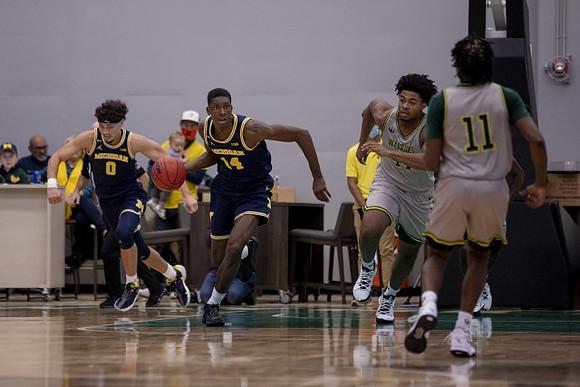Adrien Nunez (0) and Moussa Diabate (14)