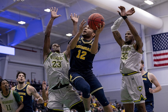 Brandon Johns Jr. (23), DeVante' Jones (12), and Hunter Dickinson (1)