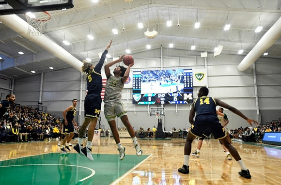 Caleb Houstan (22), Terrance Williams II (5), and Moussa Diabate (14)