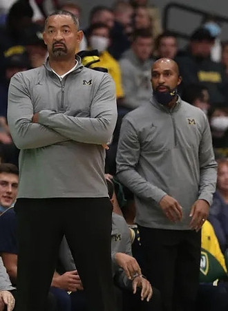 Juwan Howard and Saddi Washington