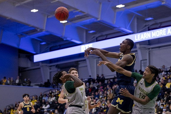 Adrien Nunez (0) and Moussa Diabate (14)