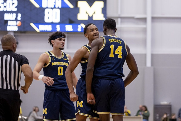 Adrien Nunez (0), DeVante' Jones (12), and Moussa Diabate (14)