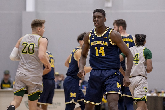 Moussa Diabate (14), Caleb Houstan (22), Adrien Nunez (0), and Hunter Dickinson (1)