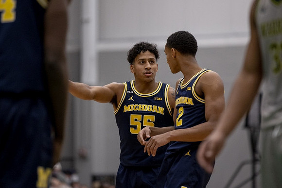 Eli Brooks (55) and Kobe Bufkin (2)