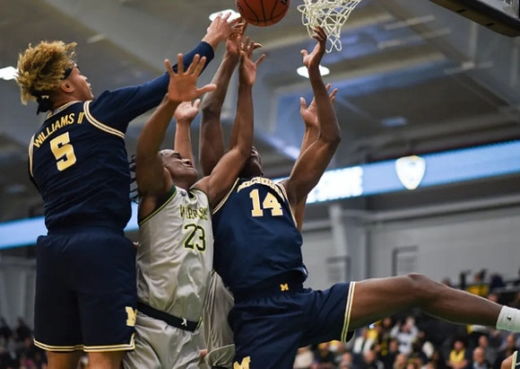 Terrance Williams II (5) and Moussa Diabate (14)