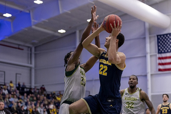 Caleb Houstan (22) and Brandon Johns Jr. (23)