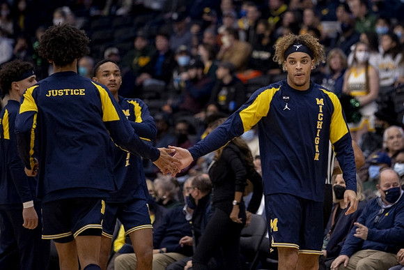 Terrance Williams II (5) and Michigan Team