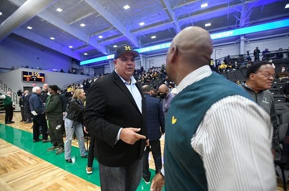 Warde Manuel and Wayne State Head Coach David Greer