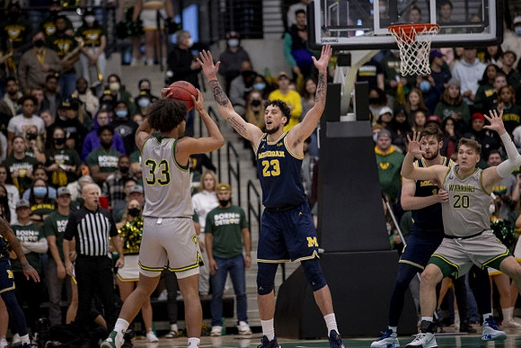 Brandon Johns Jr. (23) and Hunter Dickinson (1)