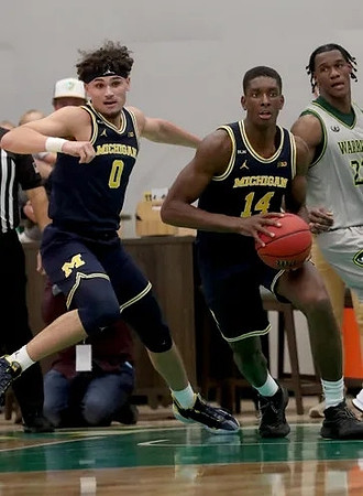 Adrien Nunez (0) and Moussa Diabate (14)