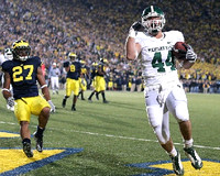 Brandon Harrison (27) and Jonas Mouton (8)