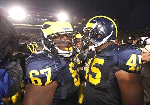 Terrance Taylor (67) and Obi Ezeh (45)