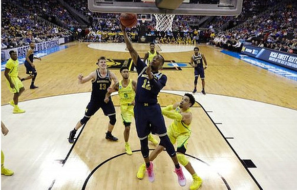 Zak Irvin (21), Moritz Wagner (13), Muhammad-Ali Abdur-Rahkman (12), and Derrick Walton Jr. (10)